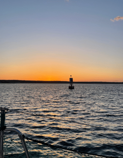 sail the gift buoy sunset